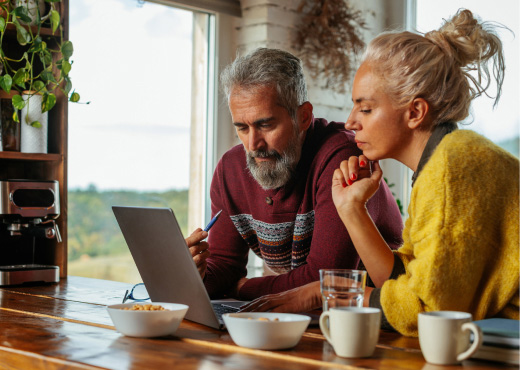 Mature couple looking over finances