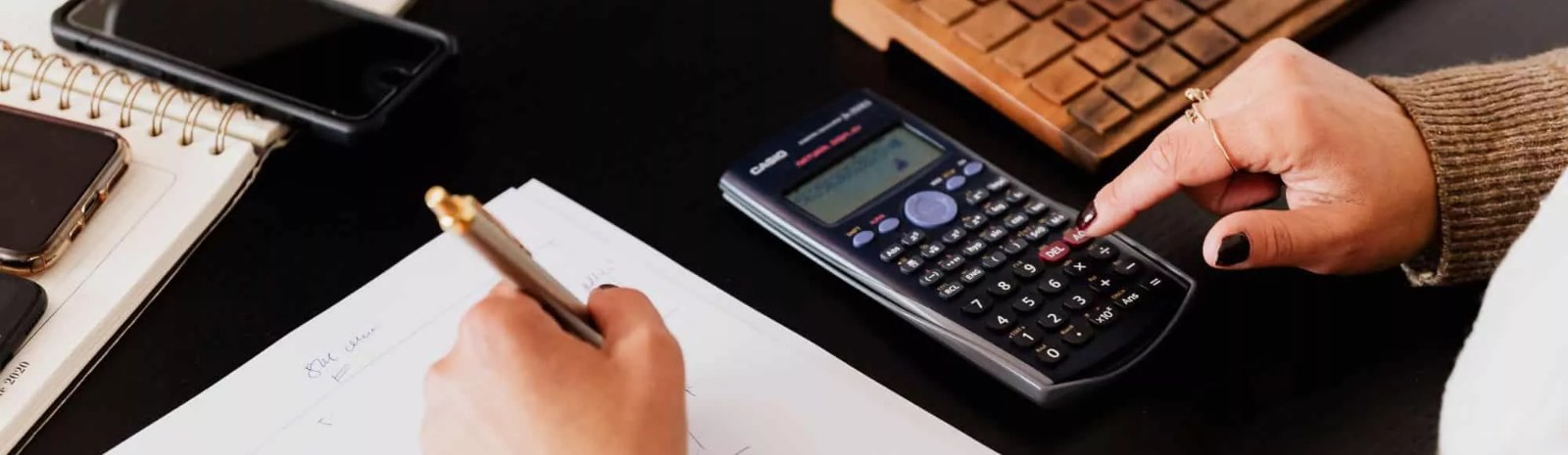 a person calculating their figures